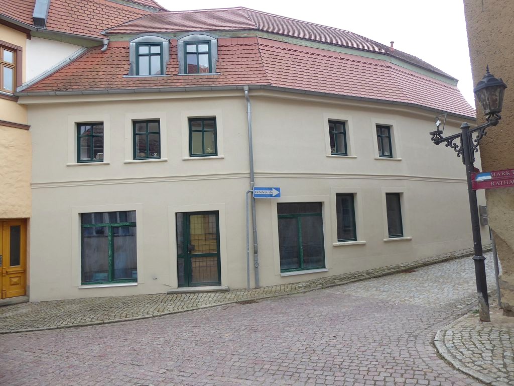 Vermietetes Wohn- und Geschäftshaus in zentraler Innenstadtlage * mit einer Jahresnettomiete von 13.110 € und einer PV-Anlage *